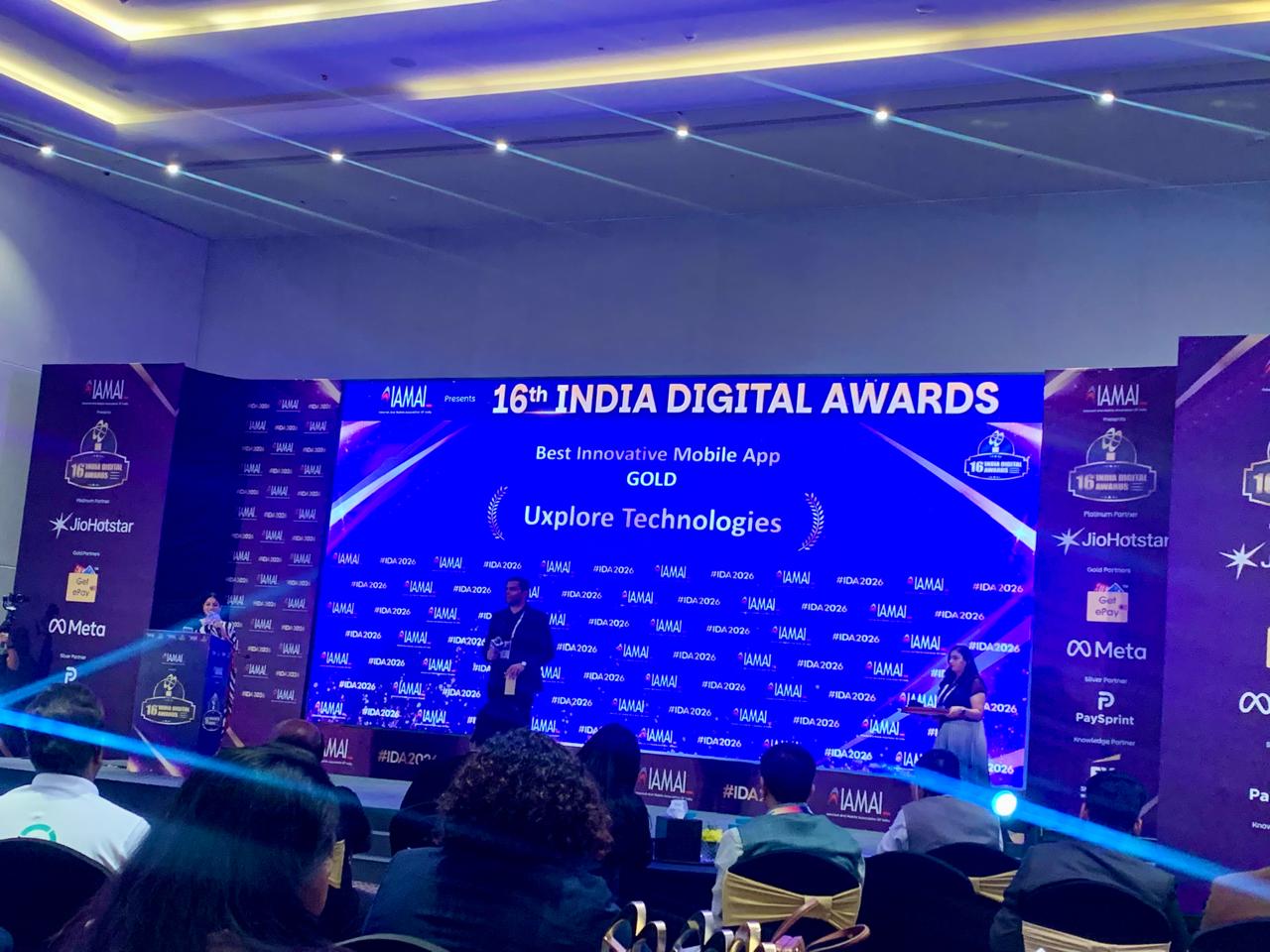 16th India Digital Awards stage announcing Uxplore Technologies as Gold winner